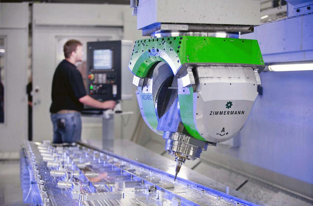 Two views of one of the Zimmermann M3 ABC 3-axis CNC fork milling heads, which allow up to 6-axis machining using both gantries